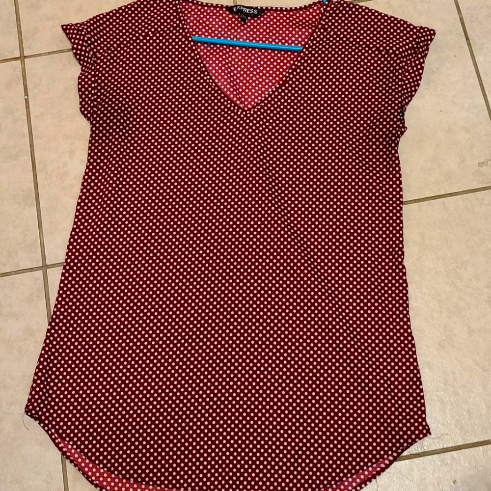 Red and white polka dot v neck blouse
